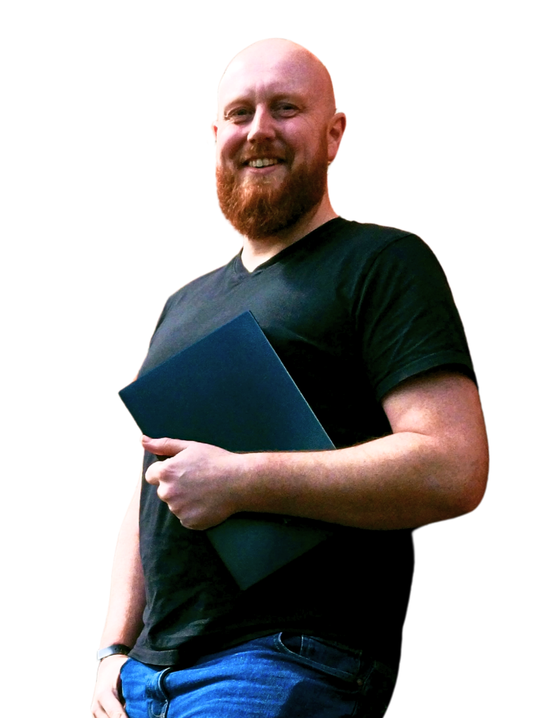 Picture of Richard holding a laptop - Virtual Assistant Services